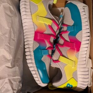 New Balance Kids Sneakers in Blue, Pink, and Yellow